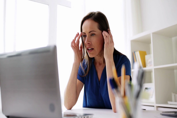 videoblocks business freelance people and technology concept tired woman with laptop computer working at home or office rtewmk8jlw thumbnail full01